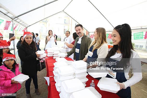 David Arquette, Elizabeth Olsen and Emily Tosta attend the Feeding America & LA Regional Food Bank Host "Hope For The Holidays" Celebrity Volunteer...