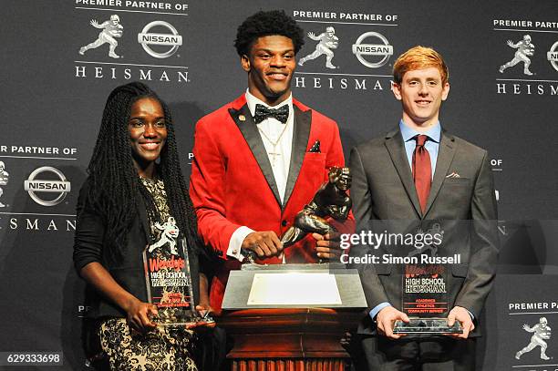 Wendy's Heisman National Winners posed with 2016 Heisman Trophy Winner Lamar Jackson after the 82nd Heisman Memorial Trophy presentation on December...