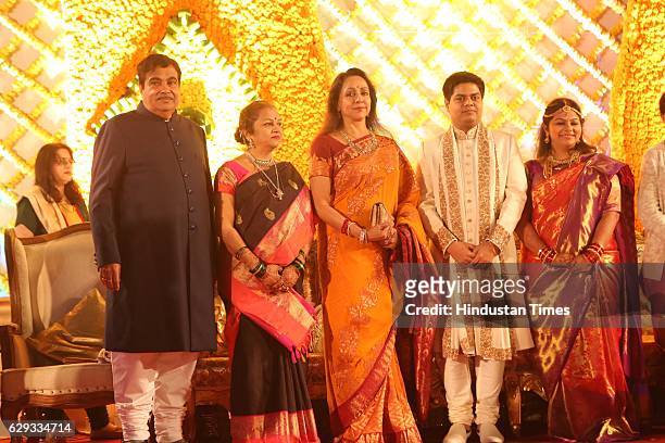 Bollywood actor Hema Malini poses with Union Minister Nitin Gadkari, his wife Kanchan Gadkari and their newlywed daughter Ketki and son-in-law Aditya...