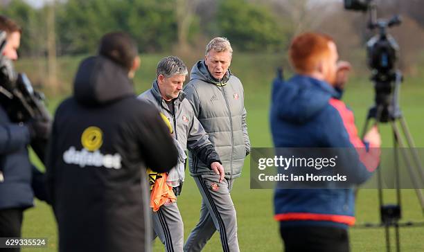 Sunderland manager David Moyes talks to his assistant Paul Bracewell during a SAFC training session at The Academy of Light on December 12, 2016 in...