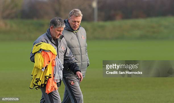 Sunderland manager David Moyes talks to his assistant Paul Bracewell during a SAFC training session at The Academy of Light on December 12, 2016 in...