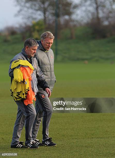 Sunderland manager David Moyes talks to his assistant Paul Bracewell during a SAFC training session at The Academy of Light on December 12, 2016 in...