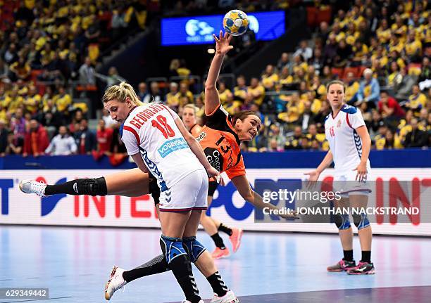 Netherlands' Yvette Broch prepares to throw the ball during the Women's European Handball Championship Group I match between Serbia and Netherlands...