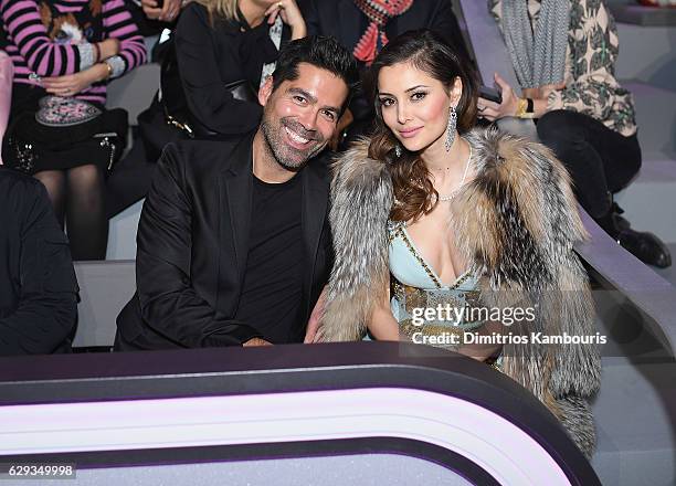 Brian Atwood and guest attend the 2016 Victoria's Secret Fashion Show on November 30, 2016 in Paris, France.