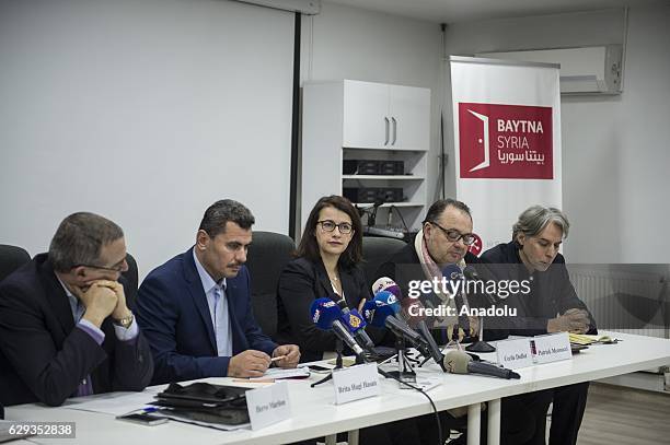 French parliament members Cecile Duflot , Herve Mariton , Patrick Mennucci , President of the City Council of Eastern Aleppo Brita Hagi Hasan and the...