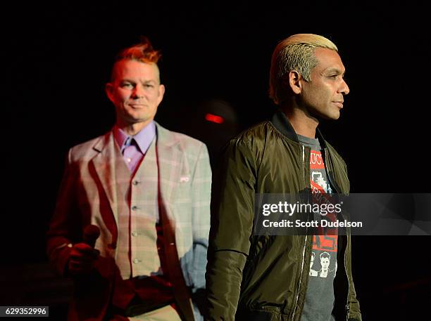 Drummer Adrian Young and bass player Tony Kanal of the band No Doubt of KROQ appear onstage during KROQ's Almost Acoustic Christmas at The Forum on...