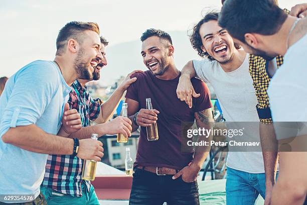 boys drinking beer and having fun - beer friends imagens e fotografias de stock