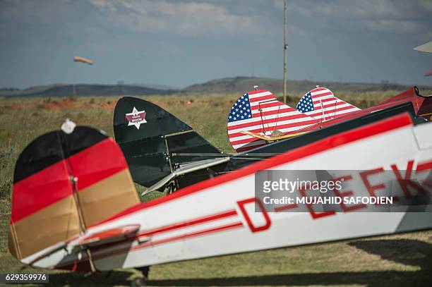 Picture taken on December 12, 2016 shows aircrafts after they landed at Baragwanath airfield as part of the Vintage Air Rally airshow. A dozen...