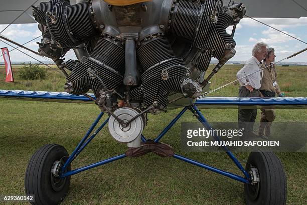 Picture taken on December 12, 2016 shows the engine of an aircraft at the Baragwanath airfield as part of the Vintage Air Rally airshow. A dozen...