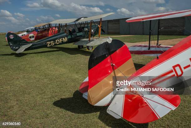 Picture taken on December 12, 2016 shows aircrafts after they landed at Baragwanath airfield as part of the Vintage Air Rally airshow. - A dozen...