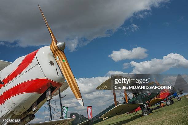 Picture taken on December 12, 2016 shows aircrafts after they landed at Baragwanath airfield as part of the Vintage Air Rally airshow. A dozen...