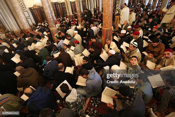 Muslims attend a religious ceremony commemorating the birth of Muslims' beloved Prophet Muhammed, known in Arabic as "Mawlid al-Nabi" at Zaytuna...