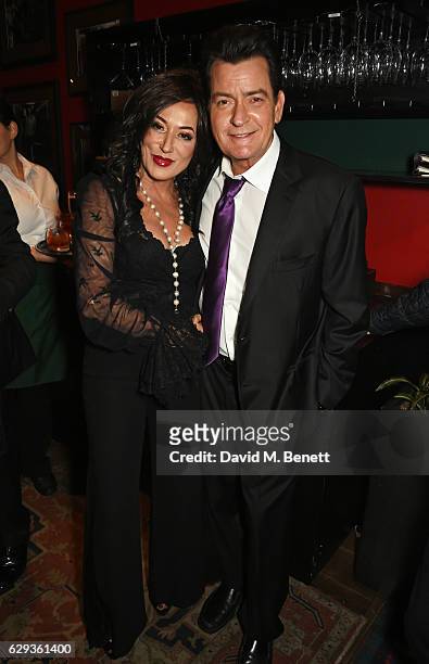 Nancy Dell'Olio and Charlie Sheen attend the Snow Queen Cigar Smoker of the Year awards at Boisdale of Canary Wharf on December 12, 2016 in London,...