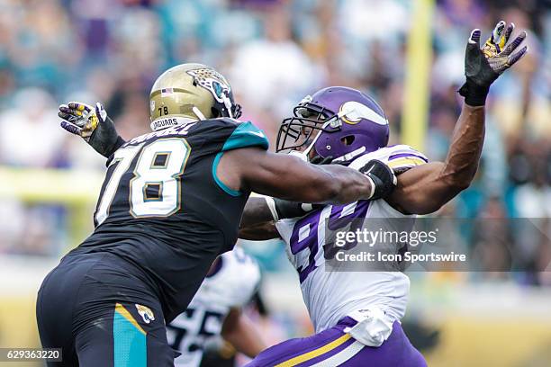 Jacksonville Jaguars Offensive Tackle Jermey Parnell blocks Minnesota Vikings Defensive End Danielle Hunter during the NFL game between the Minnesota...