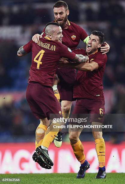 Roma's midfielder from Belgium Radja Nianggolan celebrates after scoring during the Italian Serie A football match Roma vs AC Milan at the Olympic...