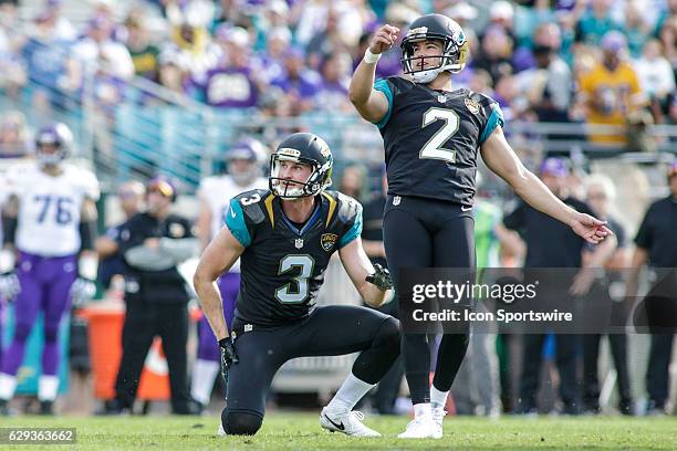 Jacksonville Jaguars Place Kicker Jason Myers and Jacksonville Jaguars Punter Brad Nortman watch a kick during the NFL game between the Minnesota...