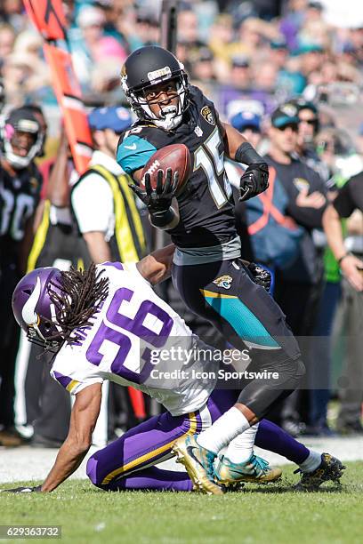 Jacksonville Jaguars Wide Receiver Allen Robinson nearly makes a catch over Minnesota Vikings Cornerback Trae Waynes during the NFL game between the...