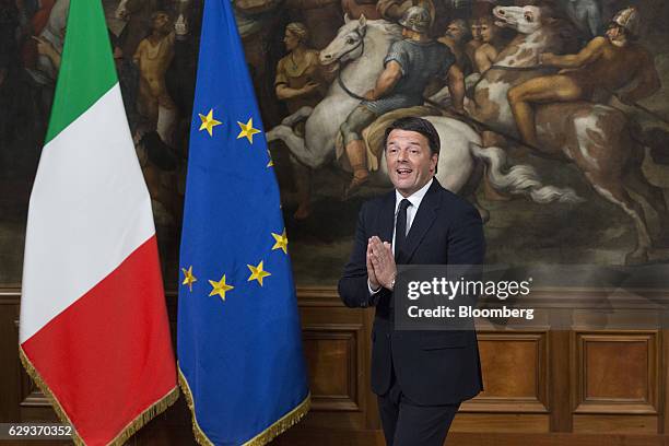 Matteo Renzi, Italy's outgoing prime minister, reacts before meeting Paolo Gentiloni, Italy's new prime minister, not pictured, at the Chigi palace...