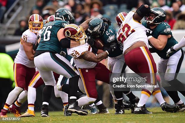 Washington Redskins Linebacker Mason Foster tackles Philadelphia Eagles Running Back Ryan Mathews during a National Football League game between the...