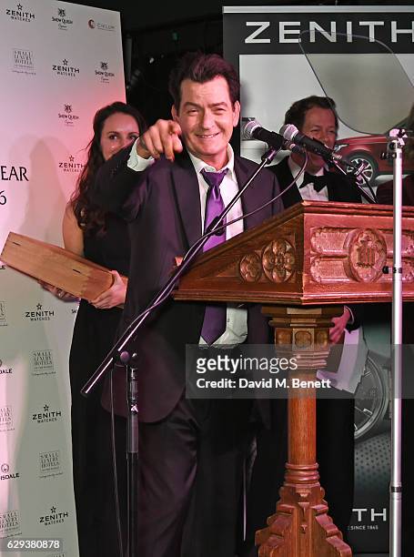 Charlie Sheen accepts the Cigar Smoker of the Year Runner-Up award at the Snow Queen Cigar Smoker of the Year awards at Boisdale of Canary Wharf on...