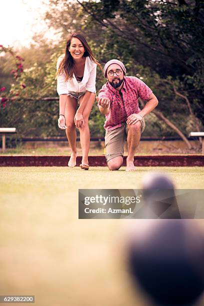 this game is awsome - lawn bowls stock pictures, royalty-free photos & images