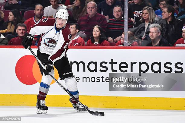 Patrick Wiercioch of the Colorado Avalanche skates the puck during the NHL game against the Montreal Canadiens at the Bell Centre on December 10,...