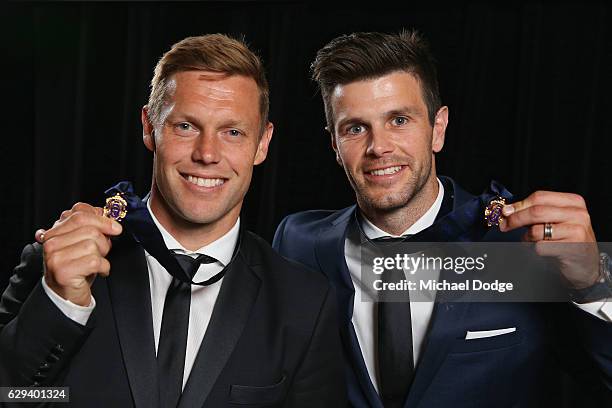 Sam Mitchell of the West Coast Eagles and Trent Cotchin of the Richmond Tigers pose with their Brownlow Medals during the 2012 Brownlow Medal...