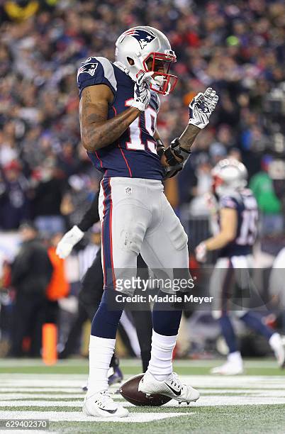 Malcolm Mitchell of the New England Patriots celebrates scoring a touchdown during the second quarter against the Baltimore Ravens at Gillette...