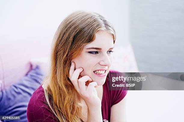 Woman with toothache.