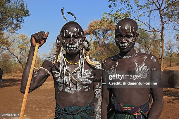 In Maco National Park, Mursi, two boys with painted faces Mursi