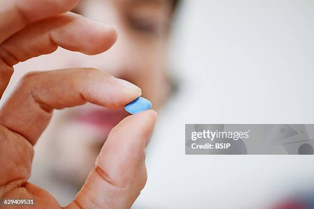 Man taking Viagra.