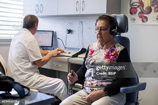 Ears, Nose & Throat, Head and Neck surgery specialist, Lyon-Nord Rillieux polyclinic. Consultation with an elderly patient to carry out an...