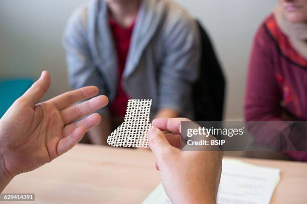 Ears, Nose & Throat, Head and Neck surgery specialist, Lyon-Nord Rillieux polyclinic. Consultation before surgery with a young man who has breathing...