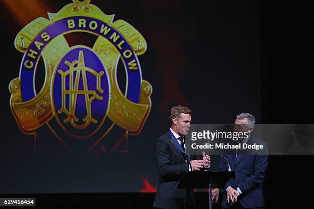 Sam Mitchell of the West Coast Eagles speaks on stage with his Brownlow Medal during the 2012 Brownlow Medal presentation on December 13, 2016 in...
