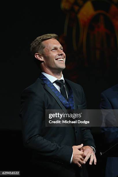 Sam Mitchell of the West Coast Eagles speaks on stage with his Brownlow Medal during the 2012 Brownlow Medal presentation on December 13, 2016 in...