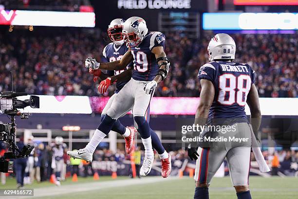 Malcolm Mitchell of the New England Patriots celebrates scoring a touchdown during the second quarter against the Baltimore Ravens at Gillette...