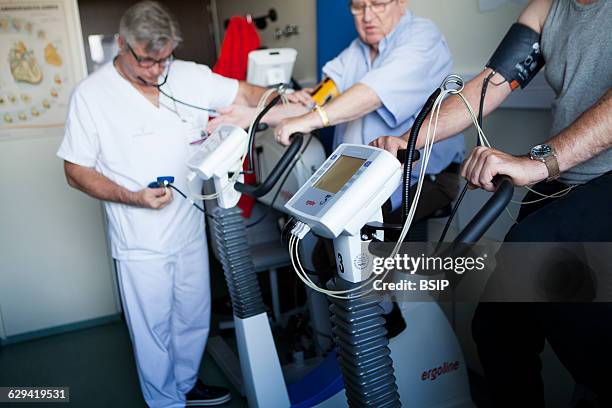 Physiotherapist Team in hospital, Haute-Savoie, France, cardiac rehabilitation session run by a physiotherapist. This session is for patients who...
