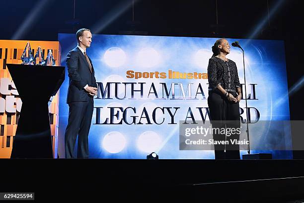 Peyton Manning and Lonnie Ali speak on stage during the Sports Illustrated Sportsperson of the Year Ceremony 2016 at Barclays Center of Brooklyn on...