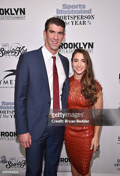 Olympic Swimmer Michael Phelps and Olympic Gymnast Aly Raisman attend the Sports Illustrated Sportsperson of the Year Ceremony 2016 at Barclays...