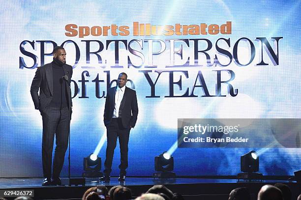 LeBron James and Jay Z speak onstage during the Sports Illustrated Sportsperson of the Year Ceremony 2016 at Barclays Center of Brooklyn on December...