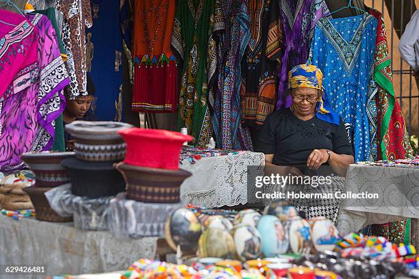 Elderly "Mama" at informal Soweto flea market on Vilakazi Street, Orlando West. Soweto, Johannesburg.