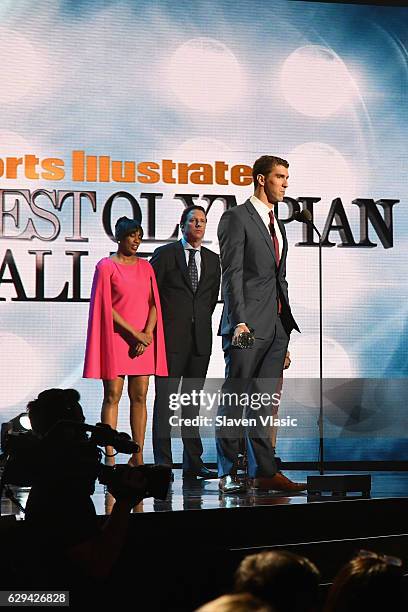 Olympic Track and Field athlete Jackie Joyner-Kersee, swimmer Tom Dolan and Olympic swimmer Michael Phelps speak onstage the Sports Illustrated...