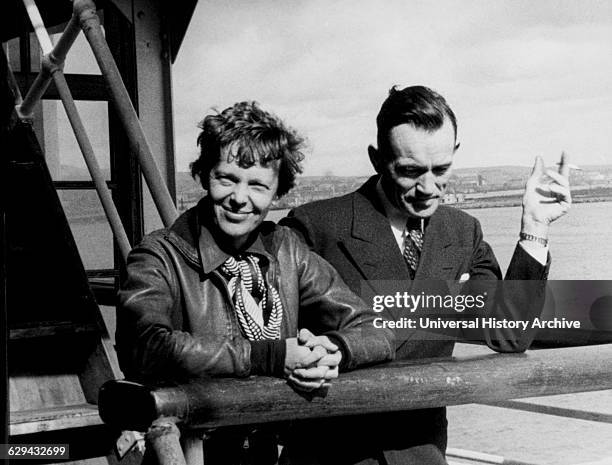 Amelia Earhart and Fred Noonan, Honolulu Airport, Hawaii, March 20, 1937.