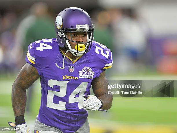 Captain Munnerlyn of the Minnesota Vikings warms up prior to an NFL game against the Green Bay Packers at US Bank Stadium September 18, 2016 in...