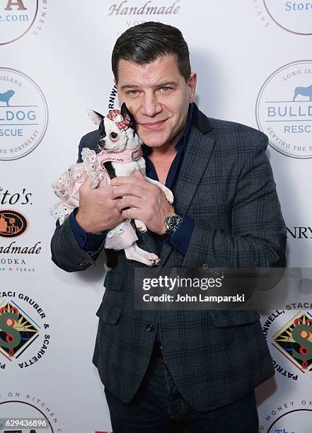 Tom Murro and dog named April Moon attend 2016 Bash for the Bulldogs Long Island Bulldog Rescue Holiday Fundraising Gala at The London Hotel on...