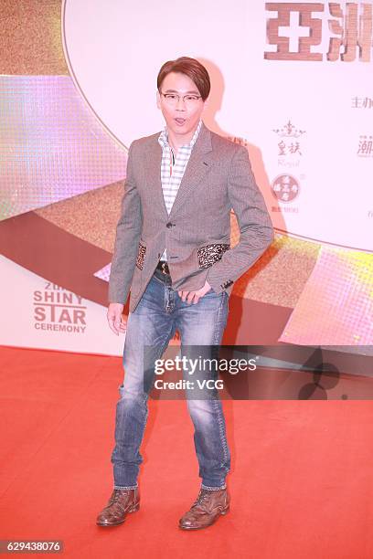 Singer David Tao attends the 2016 Shiny Star Ceremony of Asian micro business conference on December 12, 2016 in Macao, China.