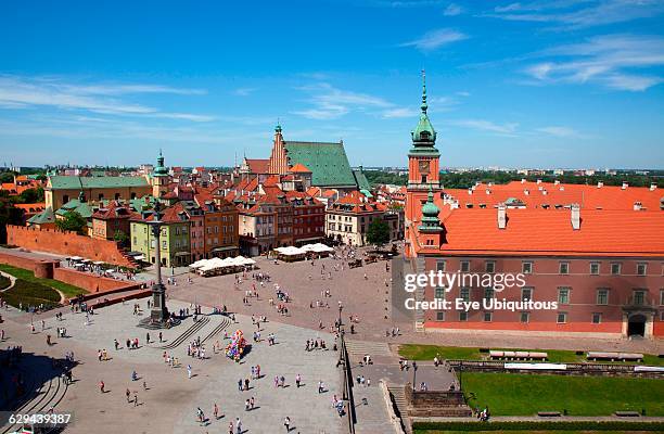 Poland. Warsaw. Old Town. Plac Zamkowy. King Sigismund III Column with crowds of tourists in the square.