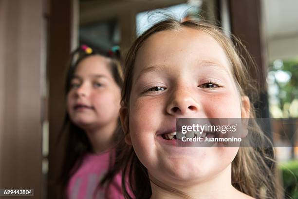 smiling little girls - chubby girls stockfoto's en -beelden