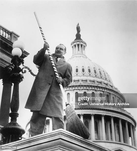 Senator Joseph McCarthy in front of U.S. Capitol, Washington D.C., Poised to Sweep Communists out of Government, 1954.