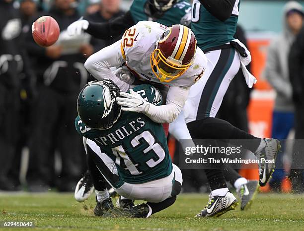 Washington Redskins cornerback Deshazor Everett hits Philadelphia Eagles running back Darren Sproles before he can catch the ball on punt return...